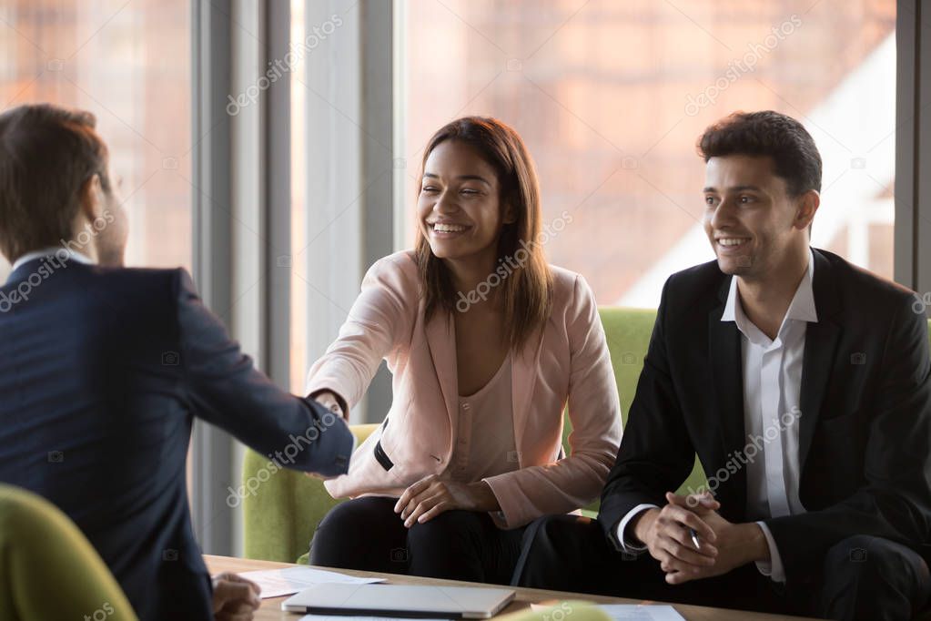 Manager discussing shift changes with staff
